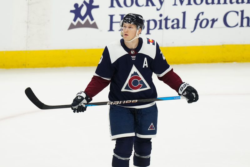 Mar 4, 2024; Denver, Colorado, USA;Colorado Avalanche center Nathan MacKinnon (29) looks up following his goal in the first period against the Chicago Blackhawks at Ball Arena. Mandatory Credit: Ron Chenoy-USA TODAY Sports