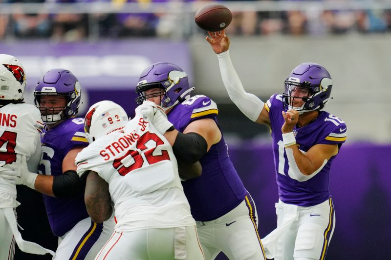 Minnesota Vikings quarterback Jaren Hall (16) throws against the Arizona Cardinals during the first half of an NFL preseason football game, Saturday, Aug. 26, 2023, in Minneapolis. (AP Photo/Abbie Parr)