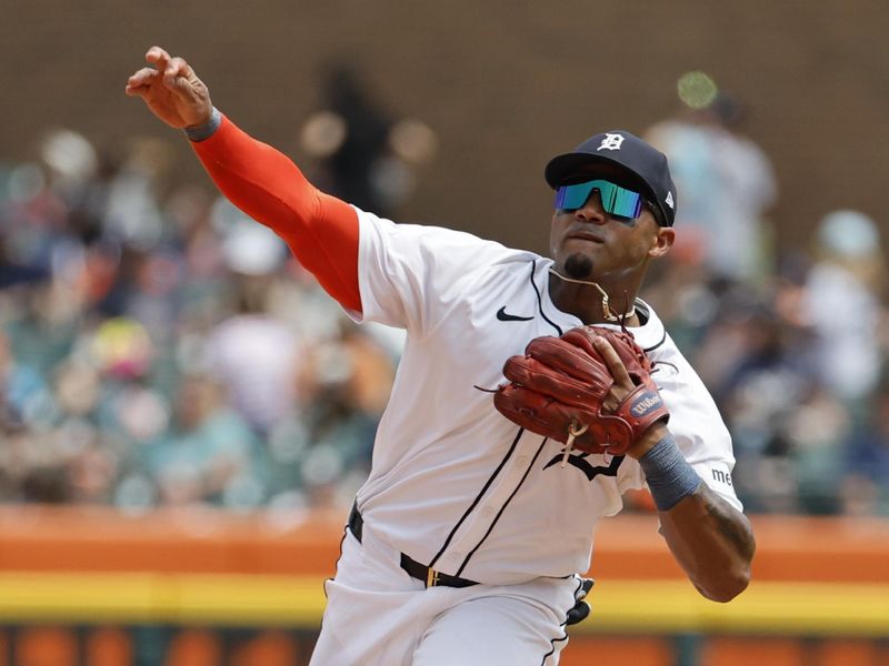 May 15, 2024; Detroit, Michigan, USA;  Detroit Tigers second base Andy Ibáñez (77) makes a throw in the sixth inning against the Miami Marlins at Comerica Park. Mandatory Credit: Rick Osentoski-USA TODAY Sports