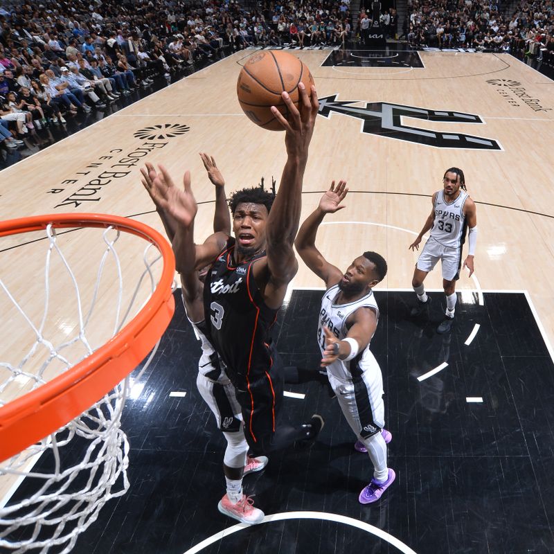 SAN ANTONIO, TX - APRIL 14: James Wiseman #13 of the Detroit Pistons drives to the basket during the game against the San Antonio Spurs on April 14, 2024 at the Frost Bank Center in San Antonio, Texas. NOTE TO USER: User expressly acknowledges and agrees that, by downloading and or using this photograph, user is consenting to the terms and conditions of the Getty Images License Agreement. Mandatory Copyright Notice: Copyright 2024 NBAE (Photos by Michael Gonzales/NBAE via Getty Images)