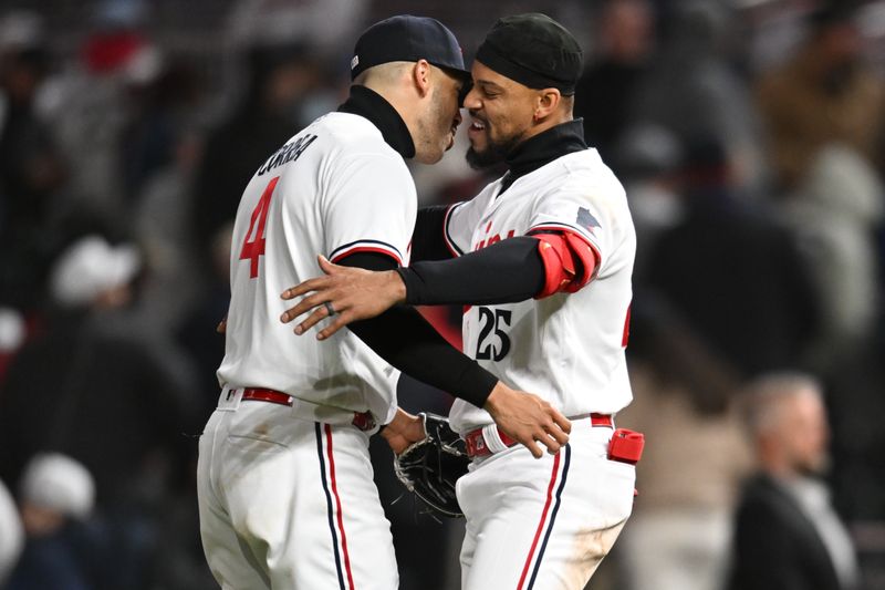 Apr 25, 2023; Minneapolis, Minnesota, USA; Minnesota Twins shortstop Carlos Correa (4) and center fielder Byron Buxton (25) celebrate after the game against the New York Yankees at Target Field. Mandatory Credit: Jeffrey Becker-USA TODAY Sports