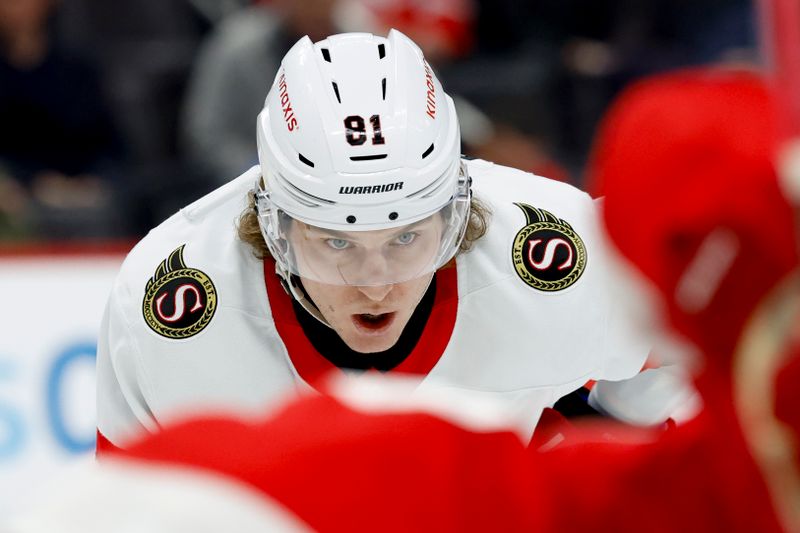 Jan 7, 2025; Detroit, Michigan, USA; Ottawa Senators right wing Adam Gaudette (81) gets set during a face-off in the first period against the Detroit Red Wings at Little Caesars Arena. Mandatory Credit: Rick Osentoski-Imagn Images