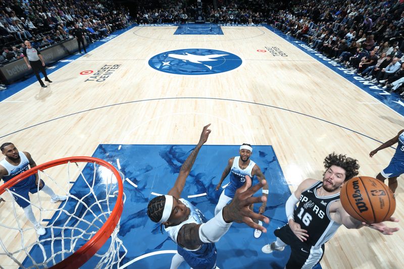 MINNEAPOLIS, MN -  FEBRUARY 27: Cedi Osman #16 of the San Antonio Spurs drives to the basket during the game against the Minnesota Timberwolves on February 27, 2024 at Target Center in Minneapolis, Minnesota. NOTE TO USER: User expressly acknowledges and agrees that, by downloading and or using this Photograph, user is consenting to the terms and conditions of the Getty Images License Agreement. Mandatory Copyright Notice: Copyright 2024 NBAE (Photo by David Sherman/NBAE via Getty Images)