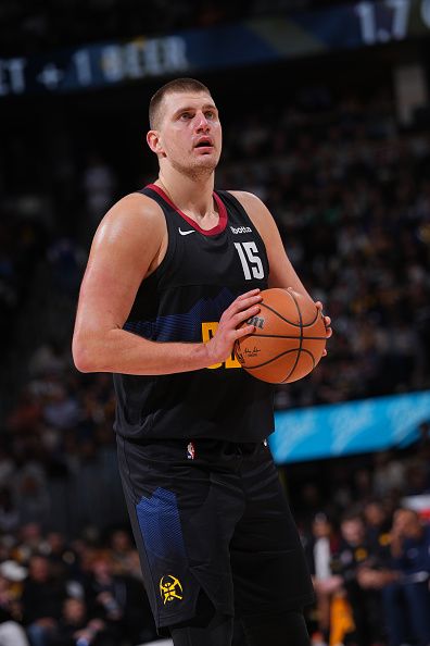 DENVER, CO - DECEMBER 18: Nikola Jokic #15 of the Denver Nuggets prepares to shoot a free throw during the game against the Dallas Mavericks on December 18, 2023 at the Ball Arena in Denver, Colorado. NOTE TO USER: User expressly acknowledges and agrees that, by downloading and/or using this Photograph, user is consenting to the terms and conditions of the Getty Images License Agreement. Mandatory Copyright Notice: Copyright 2023 NBAE (Photo by Bart Young/NBAE via Getty Images)