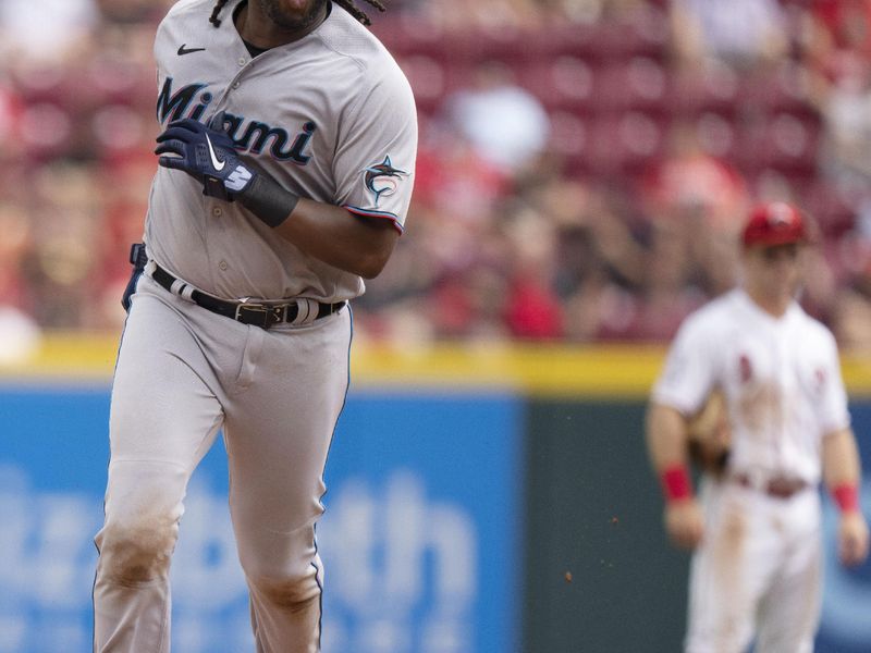 Aug 9, 2023; Cincinnati, OH, USA; Miami Marlins first baseman Josh Bell (9) rounds the bases after hitting a solo home run in the eighth inning of the MLB baseball game between Cincinnati Reds and Miami Marlins at Great American Ball Park in Cincinnati on Wednesday, Aug. 9, 2023.  Mandatory Credit: Albert Cesare-USA TODAY Sports