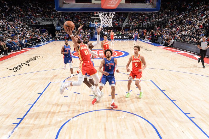 DETROIT, MI - NOVEMBER 8: Trae Young #11 of the Atlanta Hawks shoots the ball during the game against the Detroit Pistons on November  8, 2024 at Little Caesars Arena in Detroit, Michigan. NOTE TO USER: User expressly acknowledges and agrees that, by downloading and/or using this photograph, User is consenting to the terms and conditions of the Getty Images License Agreement. Mandatory Copyright Notice: Copyright 2024 NBAE (Photo by Chris Schwegler/NBAE via Getty Images)