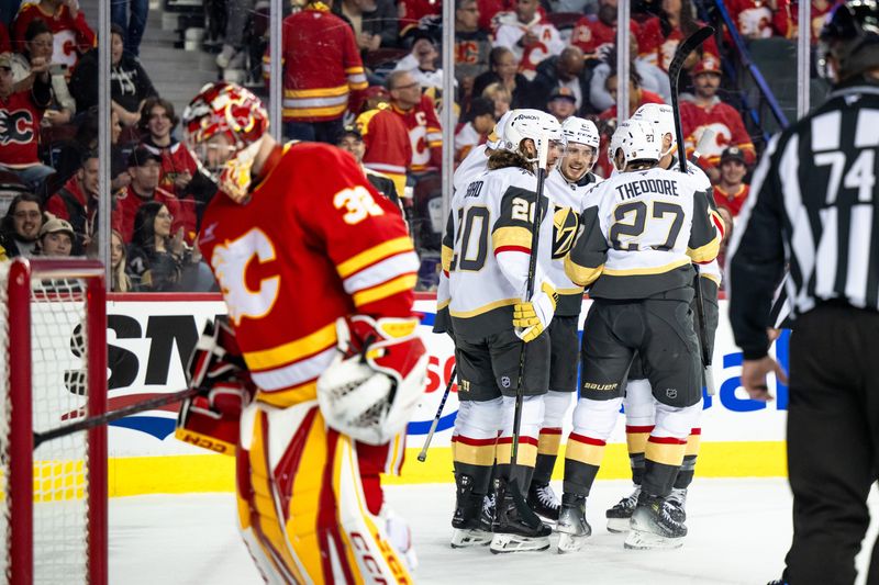 Apr 5, 2025; Calgary, Alberta, CAN; Vegas Golden Knights left wing Pavel Dorofeyev (16) celebrates with center Brett Howden (21), defenseman Shea Theodore (27) and left wing Brandon Saad (20) after scoring a goal on Calgary Flames goaltender Dustin Wolf (32) during the first period at Scotiabank Saddledome. Mandatory Credit: Brett Holmes-Imagn Images