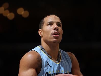 MEMPHIS, TN - DECEMBER 15:  Desmond Bane #22 of the Memphis Grizzlies shoots a free throw during the game against the Houston Rockets on December 15, 2023 at FedExForum in Memphis, Tennessee. NOTE TO USER: User expressly acknowledges and agrees that, by downloading and or using this photograph, User is consenting to the terms and conditions of the Getty Images License Agreement. Mandatory Copyright Notice: Copyright 2023 NBAE (Photo by Joe Murphy/NBAE via Getty Images)