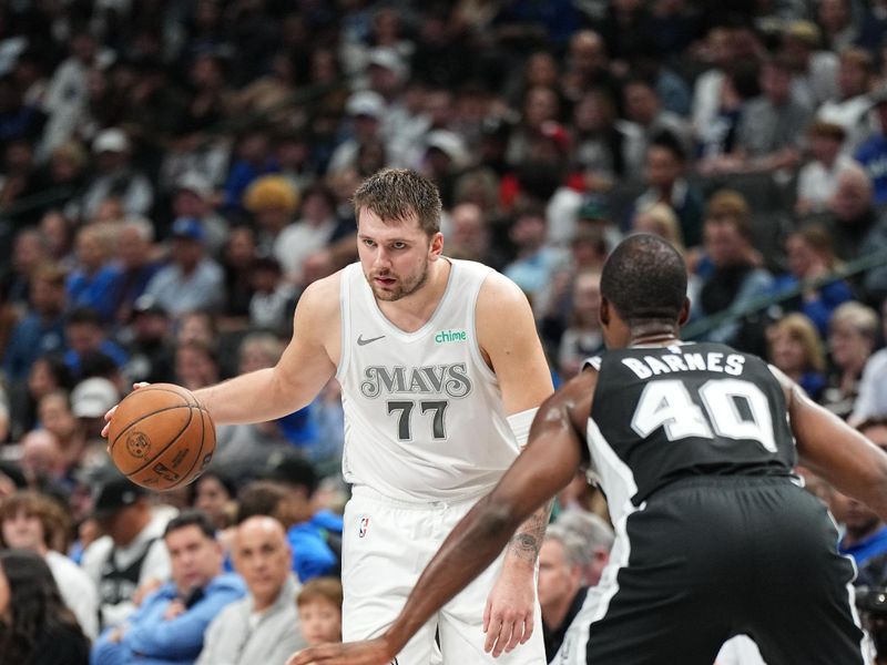 DALLAS, TX - NOVEMBER 16: Luka Doncic #77 of the Dallas Mavericks handles the ball during the game against the San Antonio Spurs on November 16, 2024 at American Airlines Center in Dallas, Texas. NOTE TO USER: User expressly acknowledges and agrees that, by downloading and or using this photograph, User is consenting to the terms and conditions of the Getty Images License Agreement. Mandatory Copyright Notice: Copyright 2024 NBAE (Photo by Glenn James/NBAE via Getty Images)