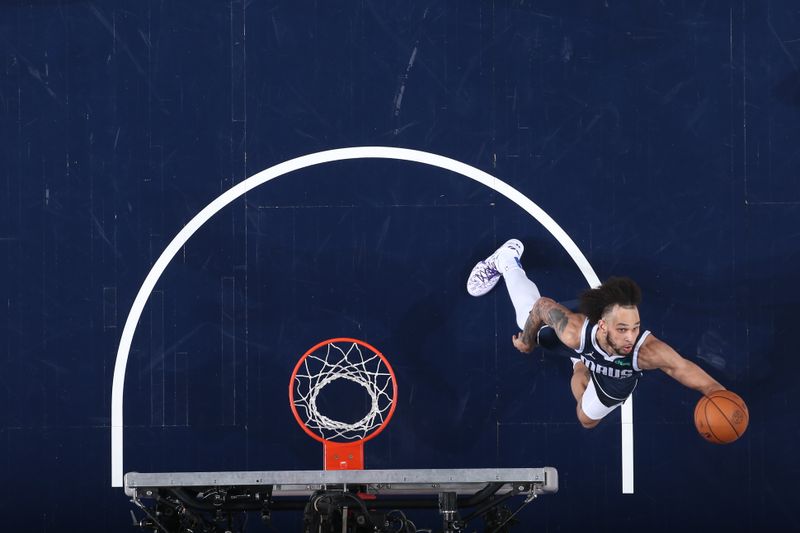 DALLAS, TX - JUNE 14: Dereck Lively II #2 of the Dallas Mavericks grabs a rebound during the game against the Boston Celtics during Game 4 of the 2024 NBA Finals on June 14, 2024 at the American Airlines Center in Dallas, Texas. NOTE TO USER: User expressly acknowledges and agrees that, by downloading and or using this photograph, User is consenting to the terms and conditions of the Getty Images License Agreement. Mandatory Copyright Notice: Copyright 2024 NBAE (Photo by Nathaniel S. Butler/NBAE via Getty Images)