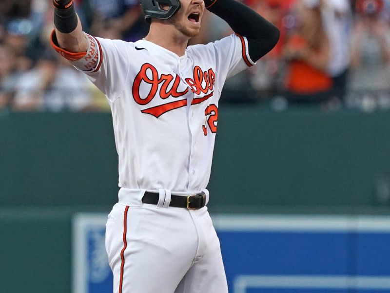 Jul 30, 2023; Baltimore, Maryland, USA; Baltimore Orioles first baseman Ryan O   Hearn (32) reacts following his run scoring double in the first inning against the New York Yankees at Oriole Park at Camden Yards. Mandatory Credit: Mitch Stringer-USA TODAY Sports