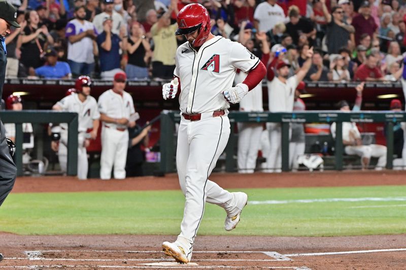 Sep 25, 2024; Phoenix, Arizona, USA; Arizona Diamondbacks first base Christian Walker (53) scores in the second inning against the San Francisco Giants at Chase Field. Mandatory Credit: Matt Kartozian-Imagn Images