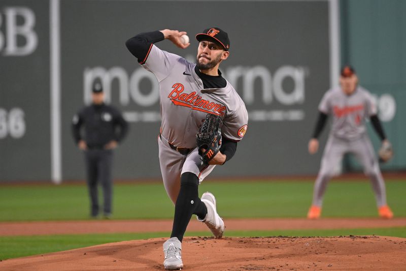 Apr 11, 20024; Boston, Massachusetts, USA; Baltimore Orioles starting pitcher Grayson Rodriguez (30) pitches against the Boston Red Sox during the first inning at Fenway Park. Mandatory Credit: Eric Canha-USA TODAY Sports