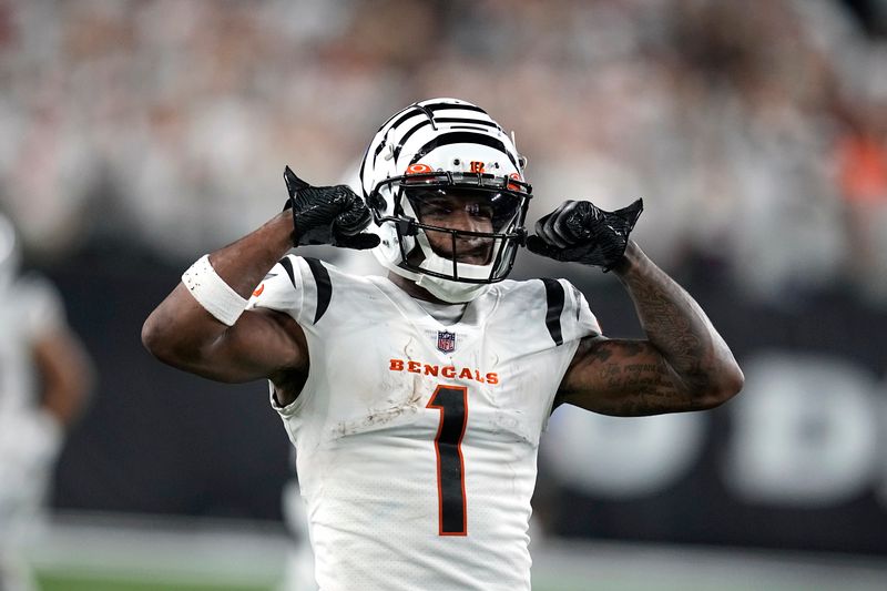 Cincinnati Bengals wide receiver Ja'Marr Chase celebrates after catching a pass during the second half of an NFL football game against the Los Angeles Rams Monday, Sept. 25, 2023, in Cincinnati. (AP Photo/Darron Cummings)