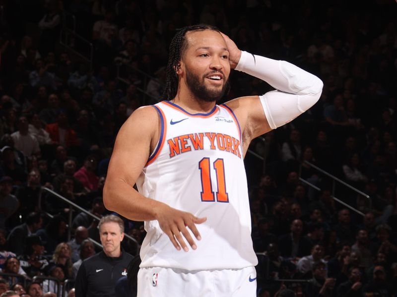 NEW YORK, NY - NOVEMBER 18: Jalen Brunson #11 of the New York Knicks reacts during the game against the Washington Wizards on November 18, 2024 at Madison Square Garden in New York City, New York.  NOTE TO USER: User expressly acknowledges and agrees that, by downloading and or using this photograph, User is consenting to the terms and conditions of the Getty Images License Agreement. Mandatory Copyright Notice: Copyright 2024 NBAE  (Photo by Nathaniel S. Butler/NBAE via Getty Images)