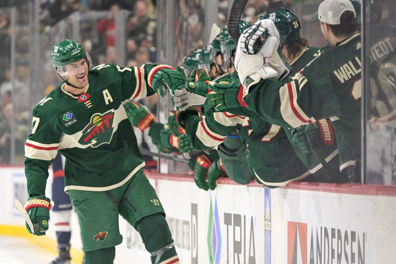 Jan 23, 2024; Saint Paul, Minnesota, USA;  Minnesota Wild forward Marcus Foligno (17) celebrates his goal against the Washington Capitals during the first period at Xcel Energy Center. Mandatory Credit: Nick Wosika-USA TODAY Sports