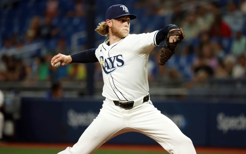 Sep 17, 2024; St. Petersburg, Florida, USA;  Tampa Bay Rays pitcher Shane Baz (11) throws a pitch against the Boston Red Sox during the first inning at Tropicana Field. Mandatory Credit: Kim Klement Neitzel-Imagn Images