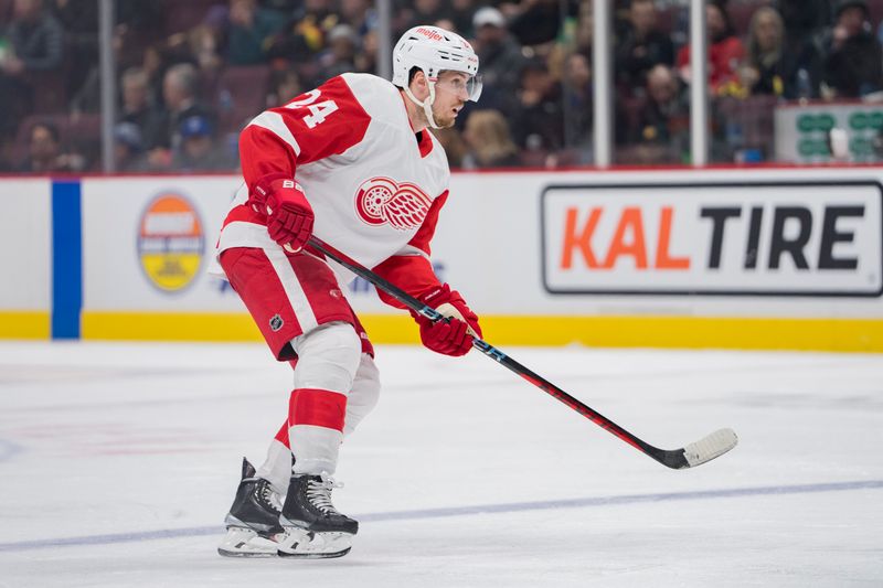 Feb 13, 2023; Vancouver, British Columbia, CAN; Detroit Red Wings forward Pius Suter (24) skates against the Vancouver Canucks in the third period at Rogers Arena. Red Wings won 6-1. Mandatory Credit: Bob Frid-USA TODAY Sports