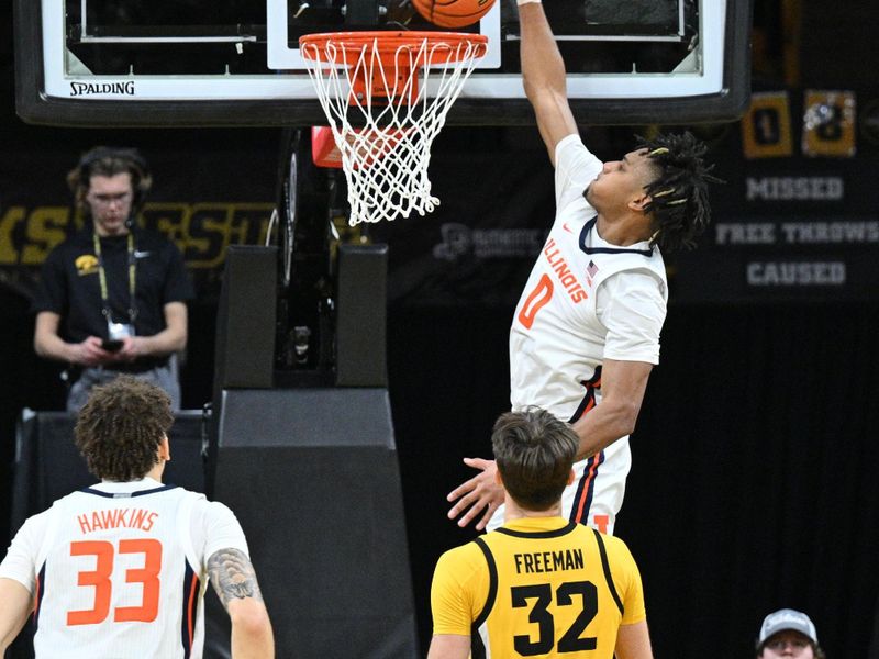 Mar 10, 2024; Iowa City, Iowa, USA; Illinois Fighting Illini guard Terrence Shannon Jr. (0) elevates for a slam dunk as forward Coleman Hawkins (33) and Iowa Hawkeyes forward Owen Freeman (32) look on during the second half at Carver-Hawkeye Arena. Mandatory Credit: Jeffrey Becker-USA TODAY Sports