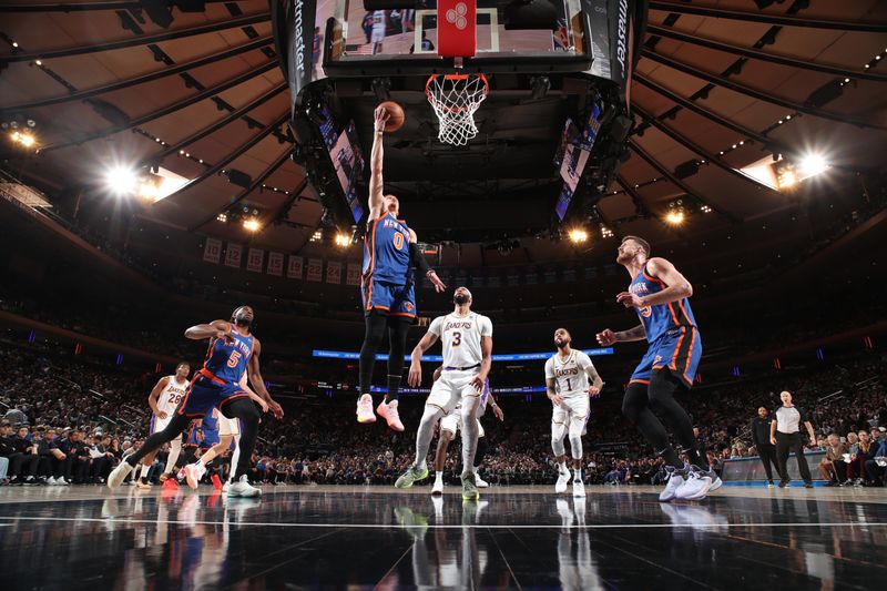 NEW YORK, NY - FEBRUARY 3: Donte Divincenzo #0 of the New York Knicks shoots the ball during the game against the Los Angeles Lakers on February 3, 2024 at Madison Square Garden in New York City, New York.  NOTE TO USER: User expressly acknowledges and agrees that, by downloading and or using this photograph, User is consenting to the terms and conditions of the Getty Images License Agreement. Mandatory Copyright Notice: Copyright 2024 NBAE  (Photo by Nathaniel S. Butler/NBAE via Getty Images)