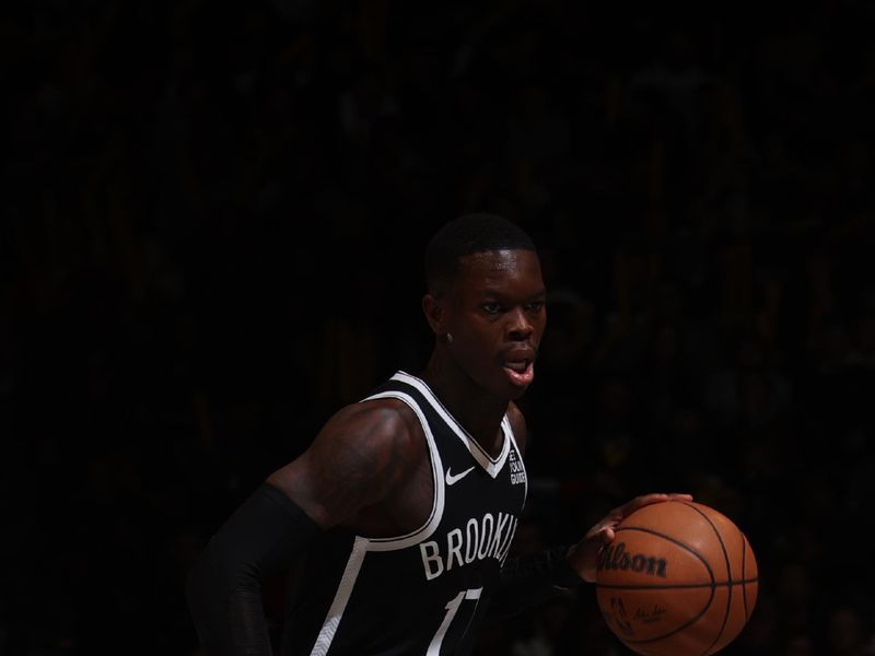 BROOKLYN, NY - DECEMBER 8: Dennis Schroder #17 of the Brooklyn Nets dribbles the ball during the game against the Milwaukee Bucks on December 8, 2024 at Barclays Center in Brooklyn, New York. NOTE TO USER: User expressly acknowledges and agrees that, by downloading and or using this Photograph, user is consenting to the terms and conditions of the Getty Images License Agreement. Mandatory Copyright Notice: Copyright 2024 NBAE (Photo by Nathaniel S. Butler/NBAE via Getty Images)