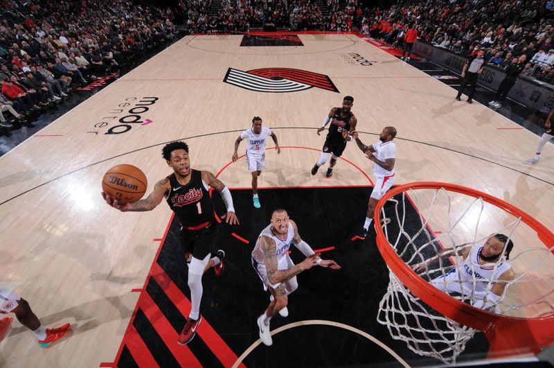 PORTLAND, OR - MARCH 20: Anfernee Simons #1 of the Portland Trail Blazers drives to the basket during the game against the LA Clippers on March 20, 2024 at the Moda Center Arena in Portland, Oregon. NOTE TO USER: User expressly acknowledges and agrees that, by downloading and or using this photograph, user is consenting to the terms and conditions of the Getty Images License Agreement. Mandatory Copyright Notice: Copyright 2024 NBAE (Photo by Cameron Browne/NBAE via Getty Images)