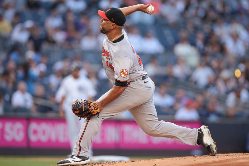 Jun 18, 2024; Bronx, New York, USA; Baltimore Orioles starting pitcher Albert Suarez (49) delivers a pitch during the first inning against the New York Yankees at Yankee Stadium. Mandatory Credit: Vincent Carchietta-USA TODAY Sports