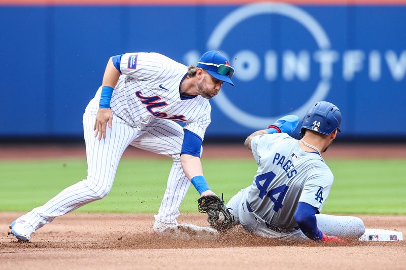 May 29, 2024; New York City, New York, USA; Los Angeles Dodgers center fielder Andy Pages (44) is tagged out attempting to steal by New York Mets second baseman Jeff McNeil (1) in the fourth inning at Citi Field. Mandatory Credit: Wendell Cruz-USA TODAY Sports