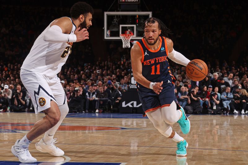 NEW YORK, NY - JANUARY 25: Jalen Brunson #11 of the New York Knicks handles the ball during the game against the Denver Nuggets on January 25, 2024 at Madison Square Garden in New York City, New York.  NOTE TO USER: User expressly acknowledges and agrees that, by downloading and or using this photograph, User is consenting to the terms and conditions of the Getty Images License Agreement. Mandatory Copyright Notice: Copyright 2024 NBAE  (Photo by Nathaniel S. Butler/NBAE via Getty Images)