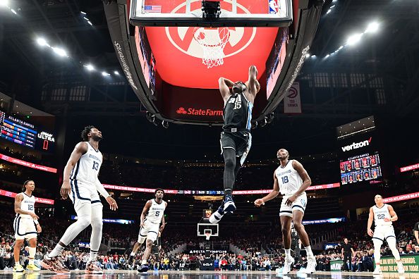 ATLANTA, GA - DECEMBER 23: Clint Capela #15 of the Atlanta Hawks dunks the ball during the game against the Memphis Grizzlies on December 23, 2023 at State Farm Arena in Atlanta, Georgia.  NOTE TO USER: User expressly acknowledges and agrees that, by downloading and/or using this Photograph, user is consenting to the terms and conditions of the Getty Images License Agreement. Mandatory Copyright Notice: Copyright 2023 NBAE (Photo by Adam Hagy/NBAE via Getty Images)