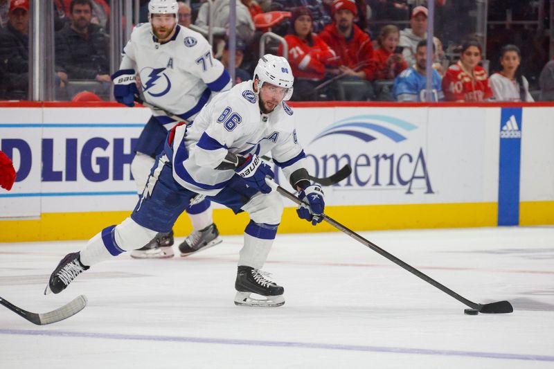 Jan 21, 2024; Detroit, Michigan, USA; Tampa Bay Lightning right wing Nikita Kucherov (86) handles the puck during the third period against the Detroit Red Wings at Little Caesars Arena. Mandatory Credit: Brian Bradshaw Sevald-USA TODAY Sports