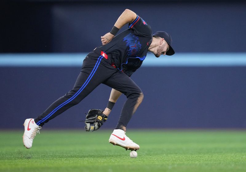 Jun 19, 2024; Toronto, Ontario, CAN; Toronto Blue Jays second baseman  Spencer Horwitz (48) tries to field the ball against the Boston Red Sox during the sixth inning at Rogers Centre. Mandatory Credit: Nick Turchiaro-USA TODAY Sports