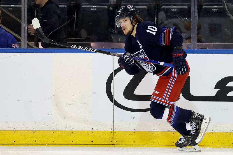 Dec 6, 2024; New York, New York, USA; New York Rangers left wing Artemi Panarin (10) skates against the Pittsburgh Penguins during the third period at Madison Square Garden. Mandatory Credit: Brad Penner-Imagn Images