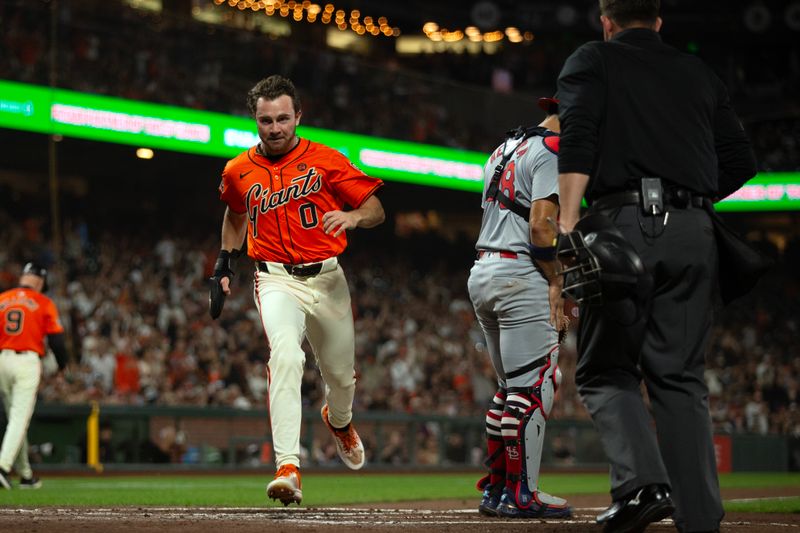 Sep 27, 2024; San Francisco, California, USA; San Francisco Giants second baseman Brett Wisely (0) scores from first base on a double by Mike Yastrzemski against the St. Louis Cardinals during the second inning at Oracle Park. Mandatory Credit: D. Ross Cameron-Imagn Images