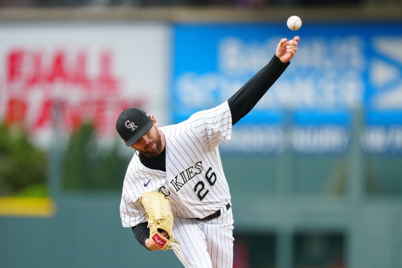 May 12, 2023; Denver, Colorado, USA; Colorado Rockies starting pitcher Austin Gomber (26) delivers a pitch in the first inning against the Philadelphia Phillies at Coors Field. Mandatory Credit: Ron Chenoy-USA TODAY Sports