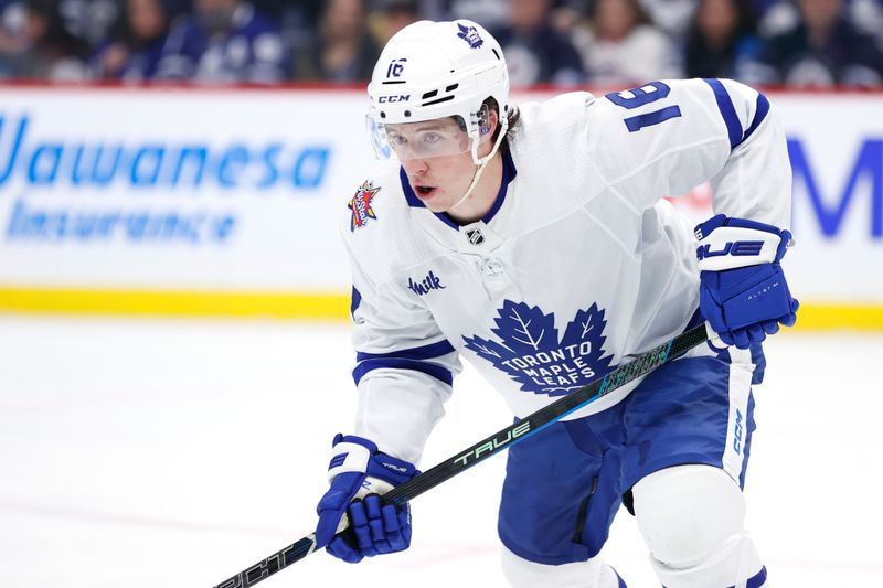 Jan 27, 2024; Winnipeg, Manitoba, CAN; Toronto Maple Leafs right wing Mitchell Marner (16) waits for a face off  in the second period against the Winnipeg Jets at Canada Life Centre. Mandatory Credit: James Carey Lauder-USA TODAY Sports