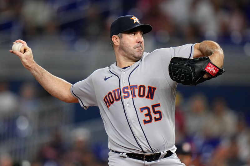 Aug 16, 2023; Miami, Florida, USA; Houston Astros starting pitcher Justin Verlander (35) throws a pitch against the Miami Marlins during the first inning at loanDepot Park. Mandatory Credit: Rich Storry-USA TODAY Sports