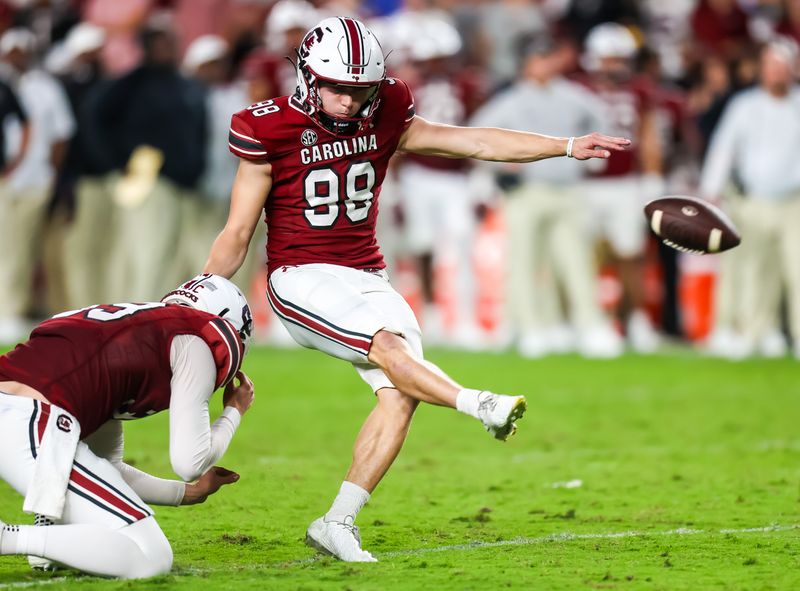 Sep 23, 2023; Columbia, South Carolina, USA; South Carolina Gamecocks place kicker Mitch Jeter (98) kicks a field goal against the Mississippi State Bulldogs in the second half at Williams-Brice Stadium. Mandatory Credit: Jeff Blake-USA TODAY Sports