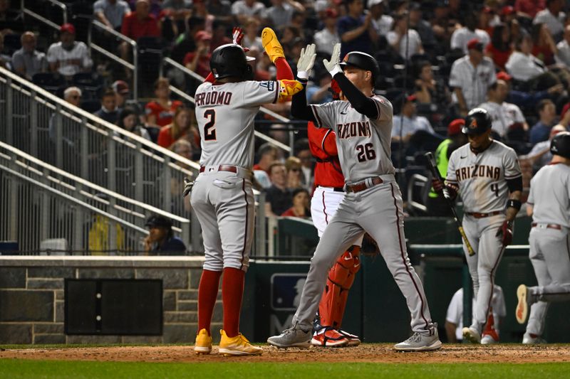 Jun 6, 2023; Washington, District of Columbia, USA; Arizona Diamondbacks right fielder Pavin Smith (26) celebrates with shortstop Geraldo Perdomo (2) after hitting a home run against the Washington Nationals during the seventh inning at Nationals Park. Mandatory Credit: Brad Mills-USA TODAY Sports