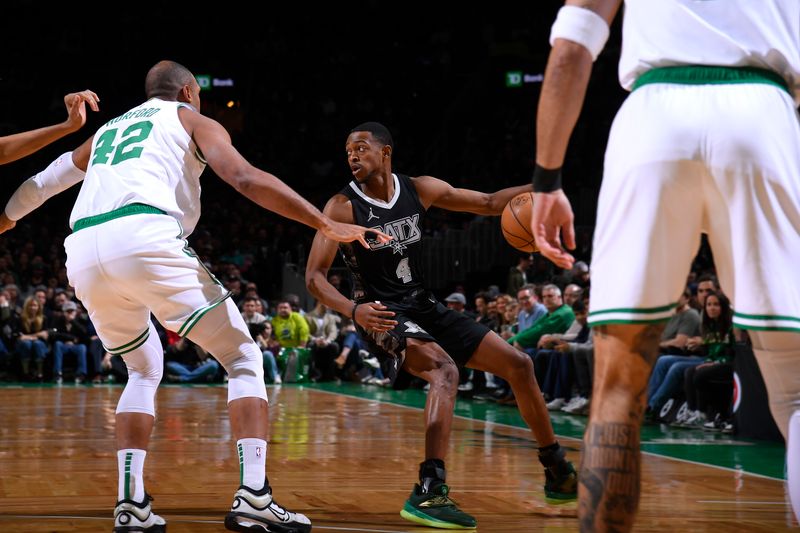 BOSTON, MA - FEBRUARY 12: De'Aaron Fox #4 of the San Antonio Spurs handles the ball during the game against the Boston Celtics on February 12, 2025 at TD Garden in Boston, Massachusetts. NOTE TO USER: User expressly acknowledges and agrees that, by downloading and/or using this Photograph, user is consenting to the terms and conditions of the Getty Images License Agreement. Mandatory Copyright Notice: Copyright 2025 NBAE (Photo by Brian Babineau/NBAE via Getty Images)