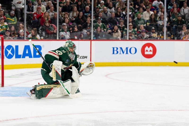 Apr 18, 2024; Saint Paul, Minnesota, USA; Minnesota Wild goaltender Marc-Andre Fleury (29)  makes a save against the Seattle Kraken in the third period at Xcel Energy Center. Mandatory Credit: Matt Blewett-USA TODAY Sports