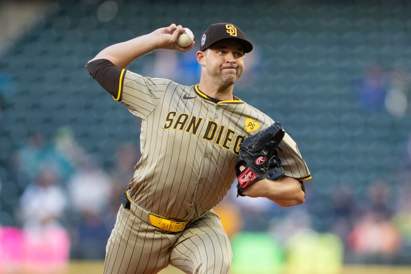 Sep 11, 2024; Seattle, Washington, USA;  San Diego Padres starter Michael King (34) delivers a pitch during the first inning against the Seattle Mariners at T-Mobile Park. Mandatory Credit: Stephen Brashear-Imagn Images