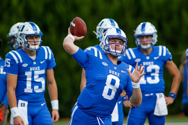 Oct 3, 2020; Durham, North Carolina, USA; Duke Blue Devils quarterback Chase Brice (8) passes the football during warm ups before playing against the Virginia Tech Hokies at Wallace Wade Stadium. Mandatory Credit: Nell Redmond-USA TODAY Sports