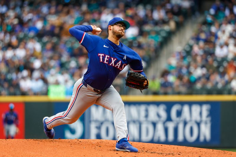 Jun 16, 2024; Seattle, Washington, USA; Texas Rangers starting pitcher Dane Dunning (33) throws against the Seattle Mariners during the first inning at T-Mobile Park. Mandatory Credit: Joe Nicholson-USA TODAY Sports