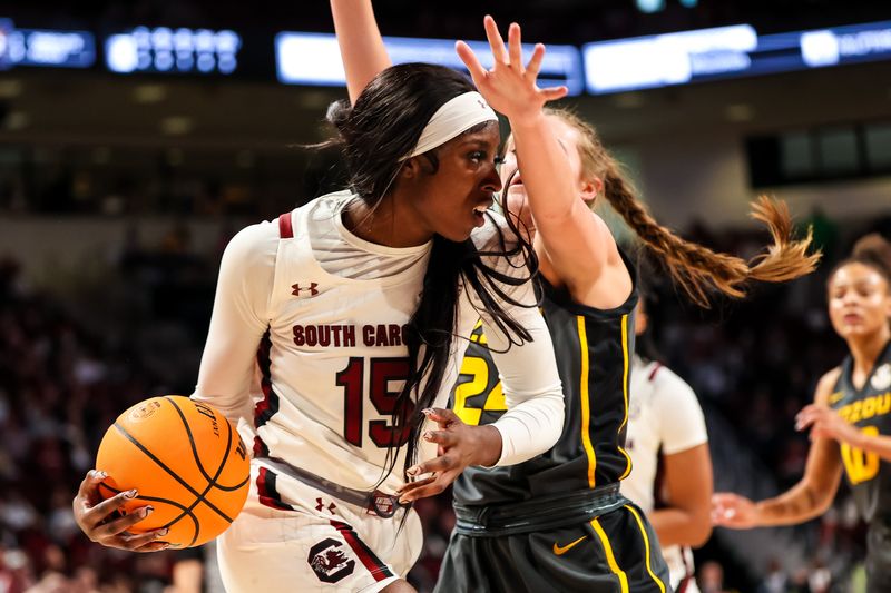 Jan 15, 2023; Columbia, South Carolina, USA; South Carolina Gamecocks forward Laeticia Amihere (15) attempts to get past Missouri Tigers guard Ashton Judd (24) in the second half at Colonial Life Arena. Mandatory Credit: Jeff Blake-USA TODAY Sports