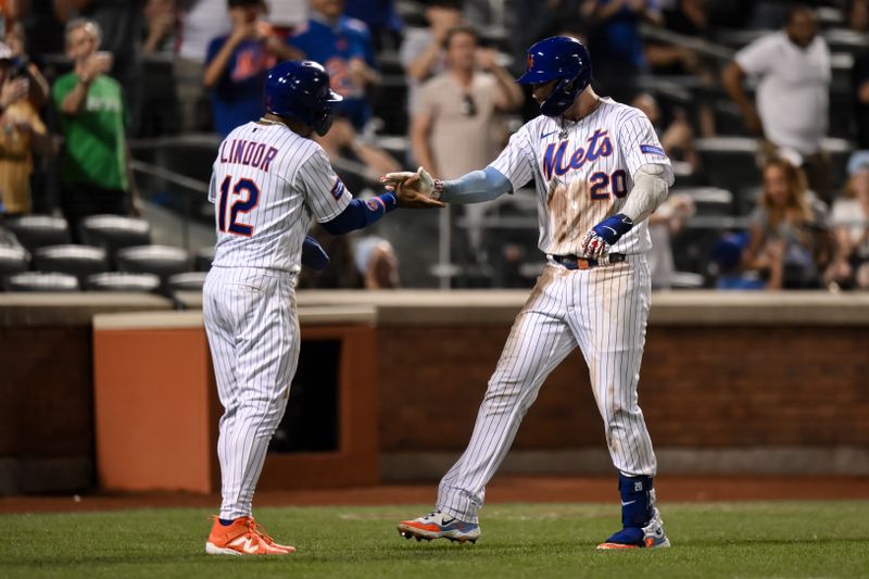 Aug 9, 2023; New York City, New York, USA; New York Mets first baseman Pete Alonso (20) is greeted at the plate by New York Mets shortstop Francisco Lindor (12) after hitting a two run home run against the Chicago Cubs during the fourth inning at Citi Field. Mandatory Credit: John Jones-USA TODAY Sports