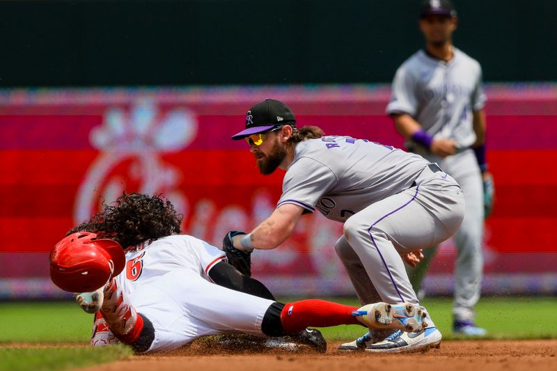 Jul 11, 2024; Cincinnati, Ohio, USA; Cincinnati Reds second baseman Jonathan India (6) slides into second after hitting a double in the third inning against Colorado Rockies second baseman Brendan Rodgers (7) at Great American Ball Park. Mandatory Credit: Katie Stratman-USA TODAY Sports