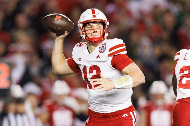 Nov 18, 2023; Madison, Wisconsin, USA;  Nebraska Cornhuskers quarterback Chubba Purdy (12) throws a pass during the third quarter against the Wisconsin Badgers at Camp Randall Stadium. Mandatory Credit: Jeff Hanisch-USA TODAY Sports