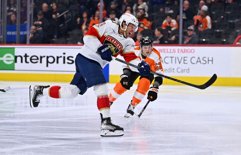 Mar 21, 2023; Philadelphia, Pennsylvania, USA; Florida Panthers center Carter Verhaeghe (23) shoots against the Philadelphia Flyers in the second period at Wells Fargo Center. Mandatory Credit: Kyle Ross-USA TODAY Sports