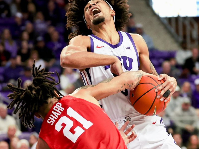 Jan 13, 2024; Fort Worth, Texas, USA;  TCU Horned Frogs guard Micah Peavy (0) tries to shoot as Houston Cougars guard Emanuel Sharp (21) defends during the first half at Ed and Rae Schollmaier Arena. Mandatory Credit: Kevin Jairaj-USA TODAY Sports